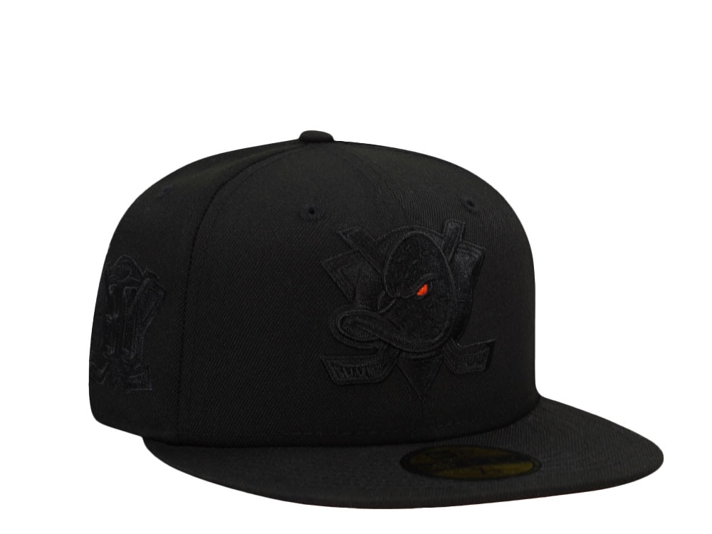 New Era Anaheim Ducks 30th Anniversary Blackout Orange Laser Prime Edition 59Fifty Fitted Cap